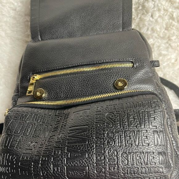 Steve Madden Black synthetic embossed small backpack gold tone hardwares. main image 6